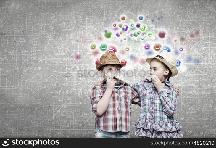 Cute girl and boy wearing shirt hat and mustache. Kids having fun