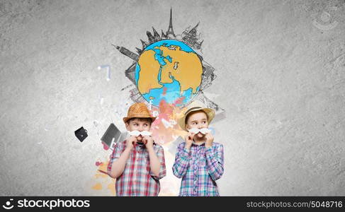 Cute girl and boy wearing shirt hat and mustache. Kids having fun