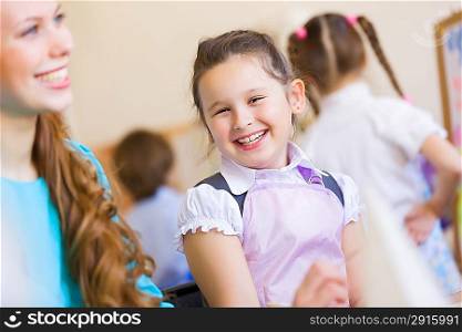 Cute girl and teacher