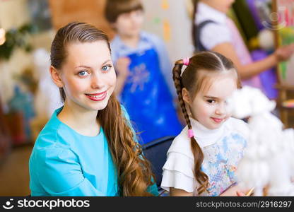 Cute girl and teacher