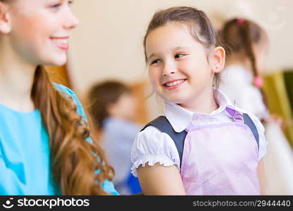 Cute girl and teacher