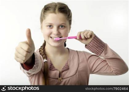 Cute girl brushing teeth isolated on white