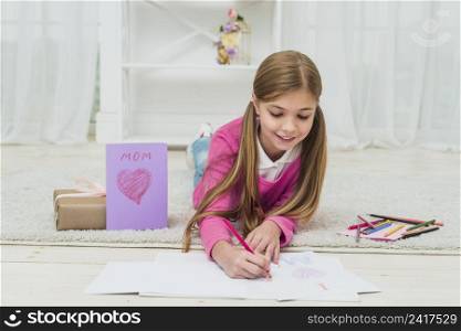 cute girl drawing paper near greeting card
