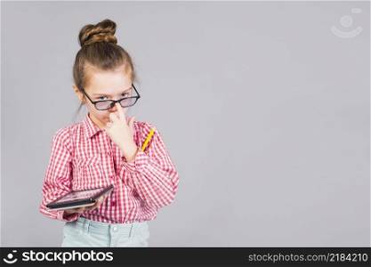 cute girl glasses standing with tablet