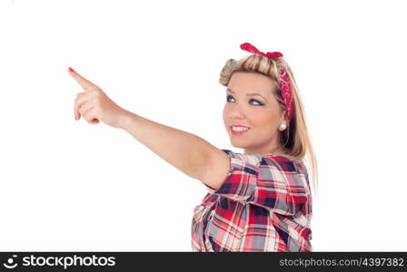 Cute girl indicating something in pinup style isolated on a white background