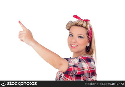 Cute girl indicating something in pinup style isolated on a white background
