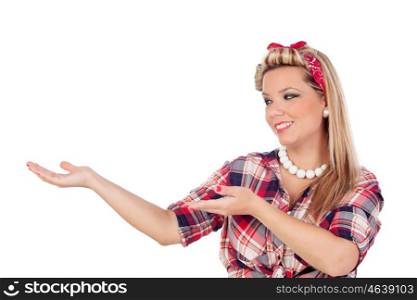 Cute girl indicating something in pinup style isolated on a white background