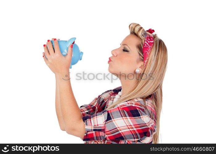 Cute girl kissing a money box in pinup style isolated on a white background