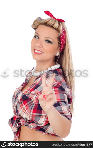 Cute girl making the sign of victory in pinup style isolated on a white background