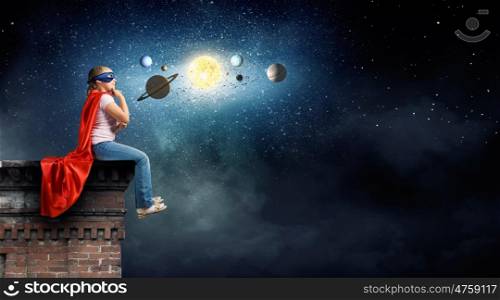 Cute girl of school age exploring space system. I will be astronaut