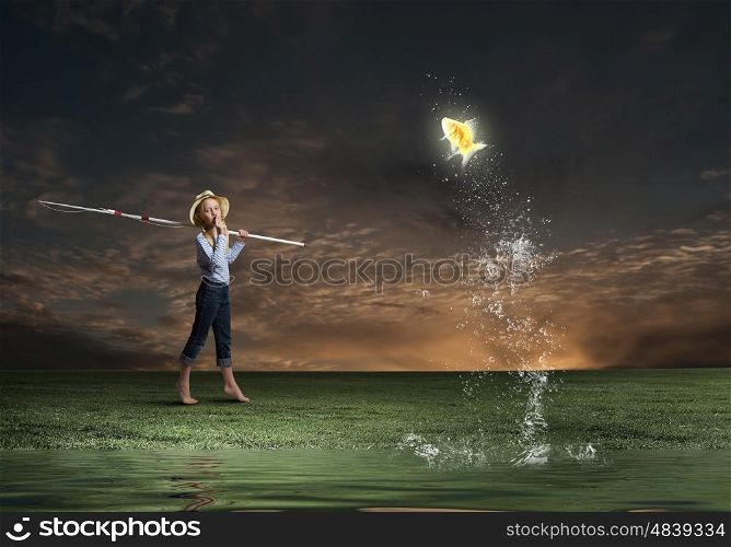 Cute girl of school age with fishing rod