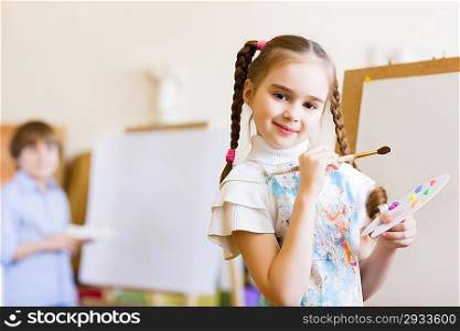Cute girl painting