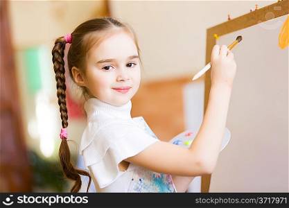 Cute girl painting