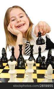 Cute girl playing chess on white