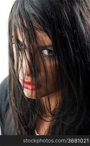 cute girl with black hair on face red lips stunning eyes looking up angry