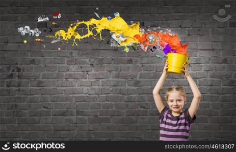 Cute girl with bucket and colorful springs coming out