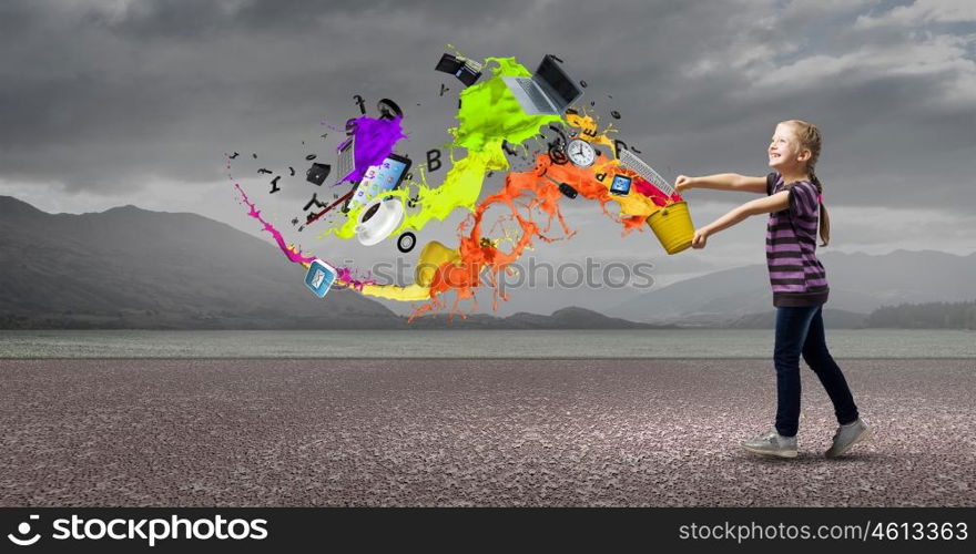 Cute girl with bucket and colorful springs coming out