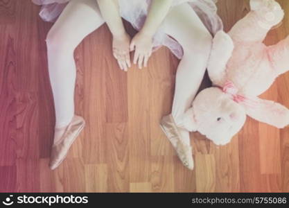 Cute girl with her teddy bear