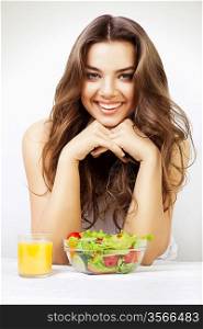 cute girl with juice and salad