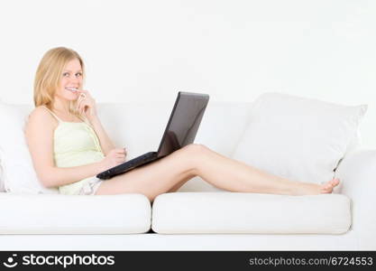 cute girl with laptop look something interesting