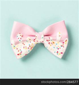 Cute hair bow on bright background, flat lay, top view