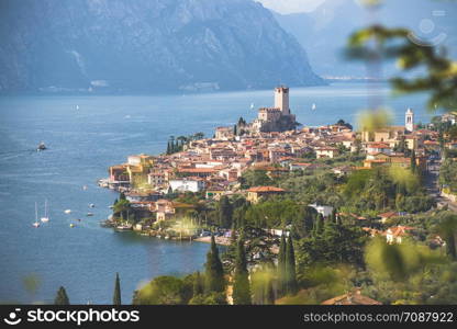 Cute idyllic Italian village and lake captured from above. Malcesine at lago di Garda.