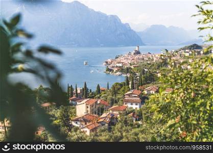 Cute idyllic Italian village and lake captured from above. Malcesine at lago di Garda.