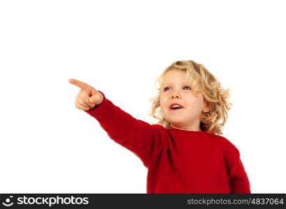 Cute kid pointing out with his finger isolated on white background