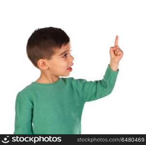 Cute kid pointing with his finger at camera. Cute kid pointing with his finger isolated on white background