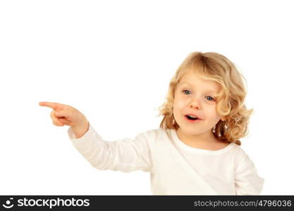 Cute kid pointing with his finger isolated on white background