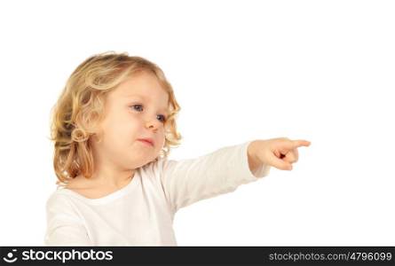 Cute kid pointing with his finger isolated on white background