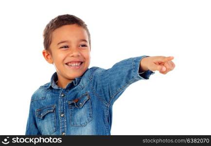 Cute kid pointing with his finger isolated on white background