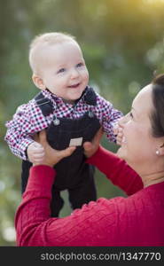 Cute Little Baby Boy Having Fun With Mommy Outdoors.