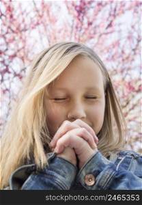 cute little blonde girl praying 2