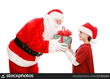 Cute little boy getting a Christmas gift from Santa Claus. Isolated on white.