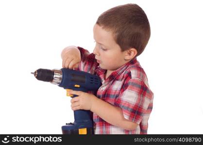 Cute little boy with a drill