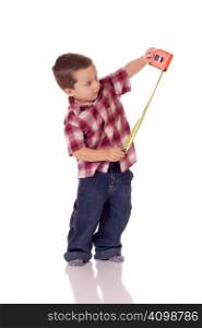 Cute little boy with a measuring tape