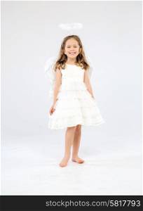 Cute little girl as an pure white angel