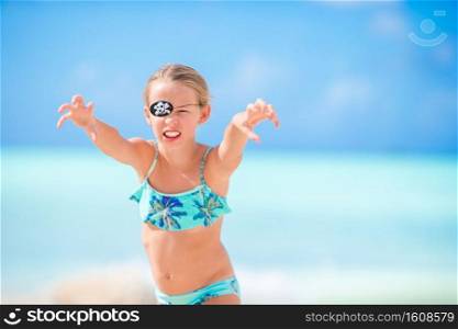 Cute little girl at beach during summer vacation. Adorable little girl at beach during summer vacation