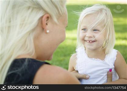 Cute Little Girl Having Fun With Her Mother Outside.
