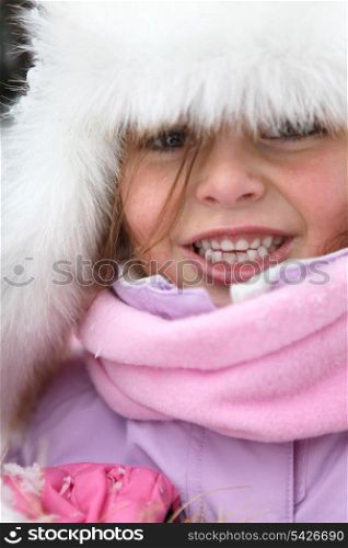 Cute little girl in snowsuit