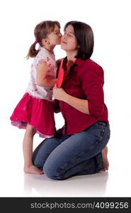 Cute little girl kissing her mom