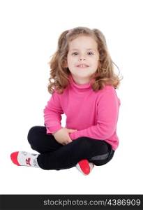Cute little girl sitting on the floor isolated on a white background