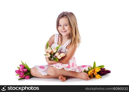 Cute little girl with flowers on white
