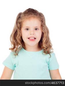 Cute little girl with three year old looking at camera showing her tongue on a white background