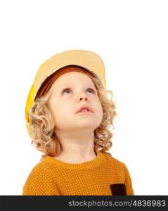 Cute little kid with yellow helmet isolated on a white background