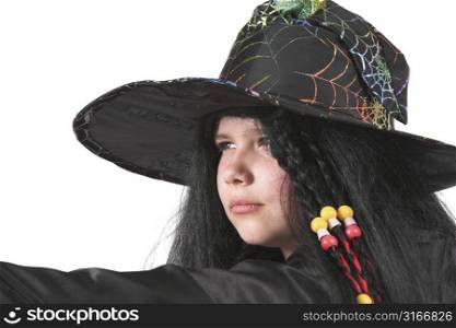 Cute little witch looking very serious