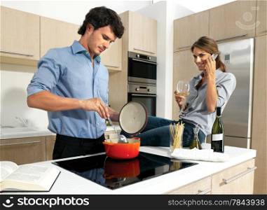 cute mature couple enjoying themselves while preparing food