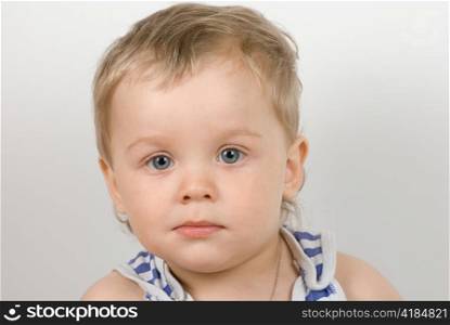 cute one year old boy studio portrait
