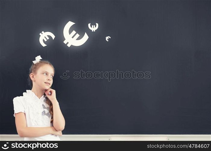 Cute school girl and drawn euro on blackboard. Money science
